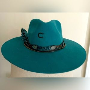 Charlie one horse teal felt fedora. Size med. feather hat band and 2 feathers
